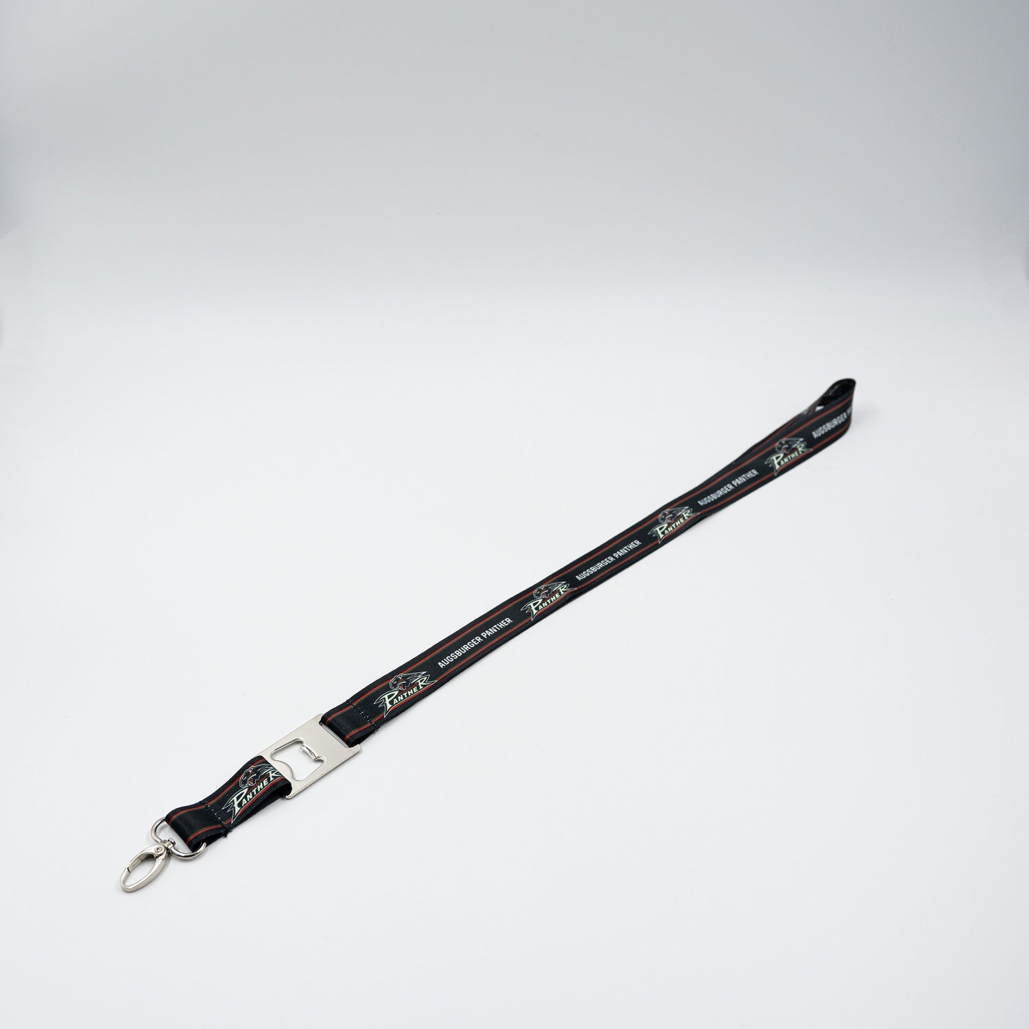 Komplett flach ausgelegtes Lanyard mit abwechselnden Pantherlogos und Augsburger Panther-Schriftzügen.