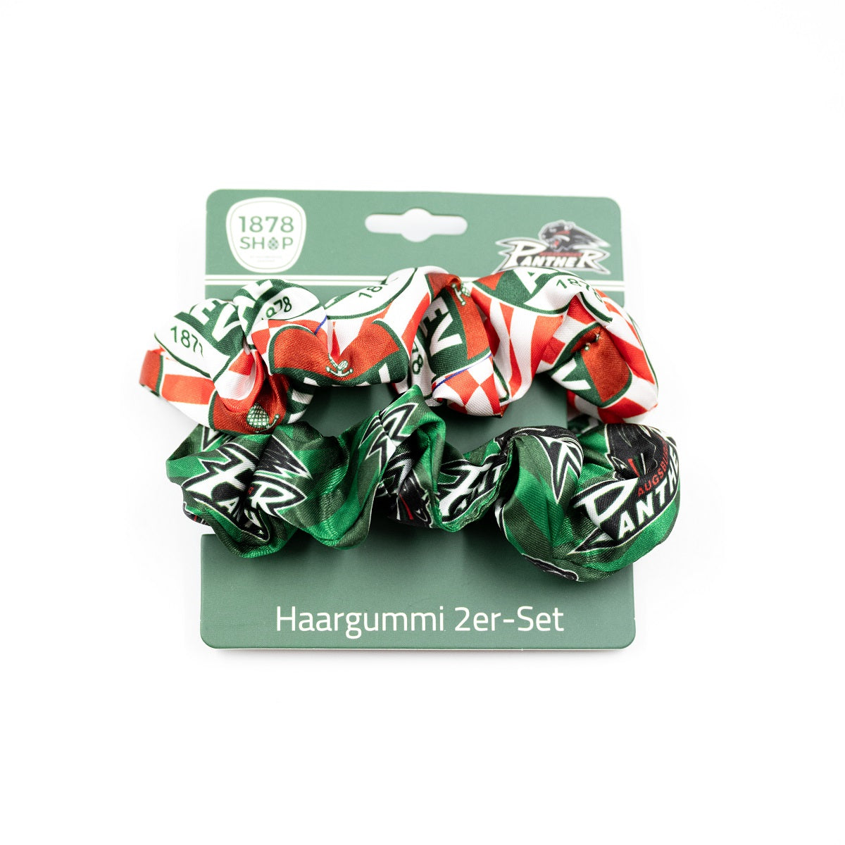 oben ist rot-weißer Haargummi mit AEV-Logo, unten ein grün gestreifter Haargummi mit Pantherlogo auf der Headercard zu erkennen